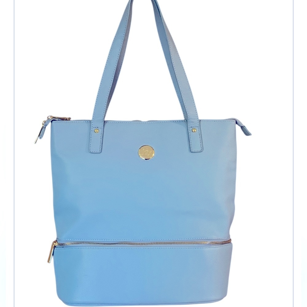 Spring Tote by JOY in a periwinkle lavender blue color. New, never used.